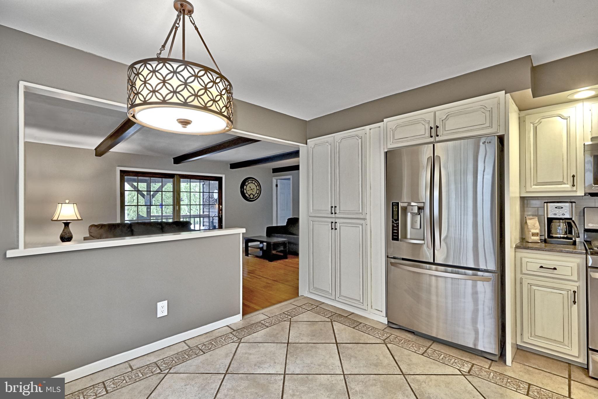 143 Whitemarsh Way Delran, NJ 08075 - Photo 14 of 33 a kitchen with stainless steel appliances kitchen island a refrigerator sink and cabinets