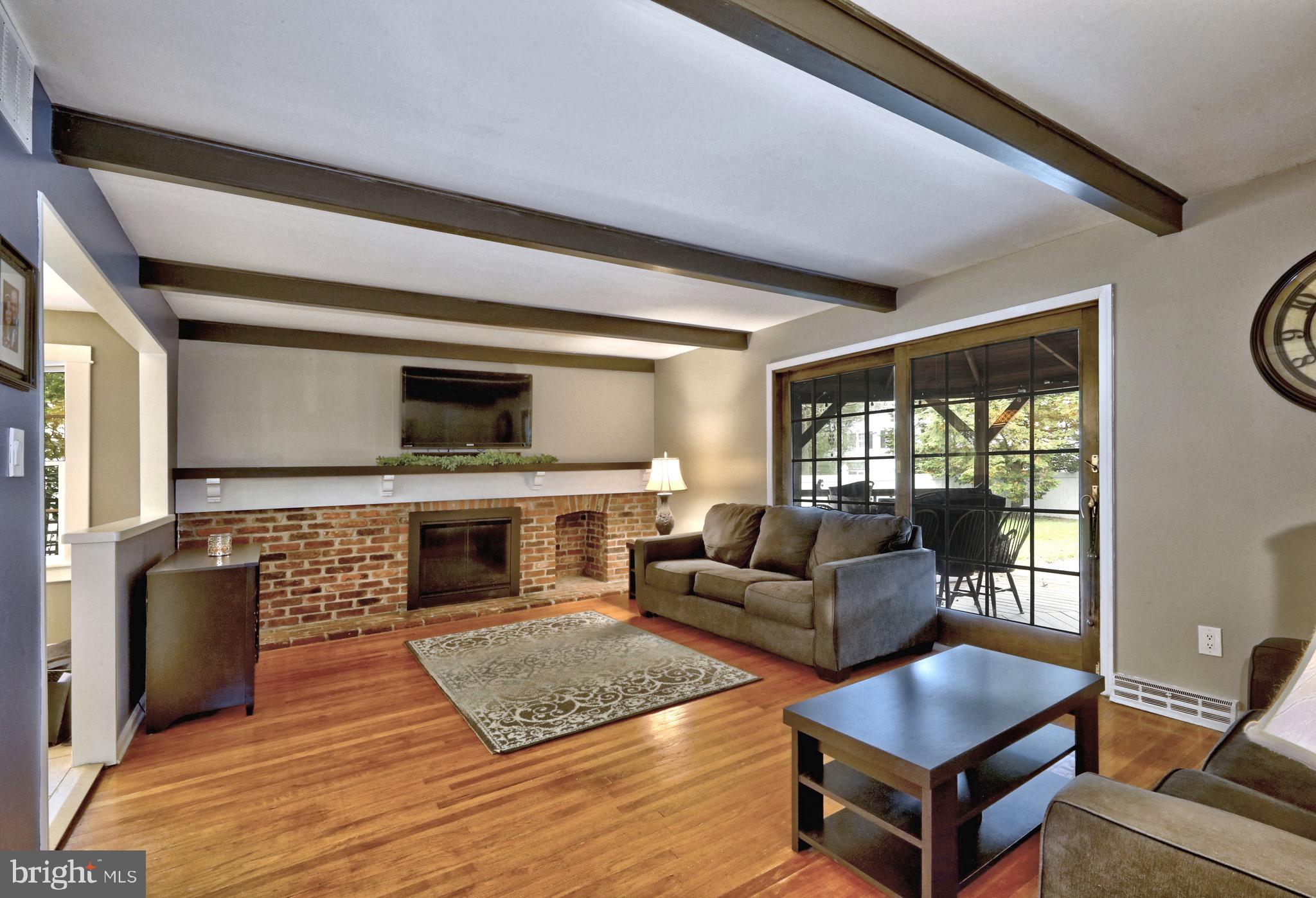 143 Whitemarsh Way Delran, NJ 08075 - Photo 18 of 33 a living room with furniture and a fireplace