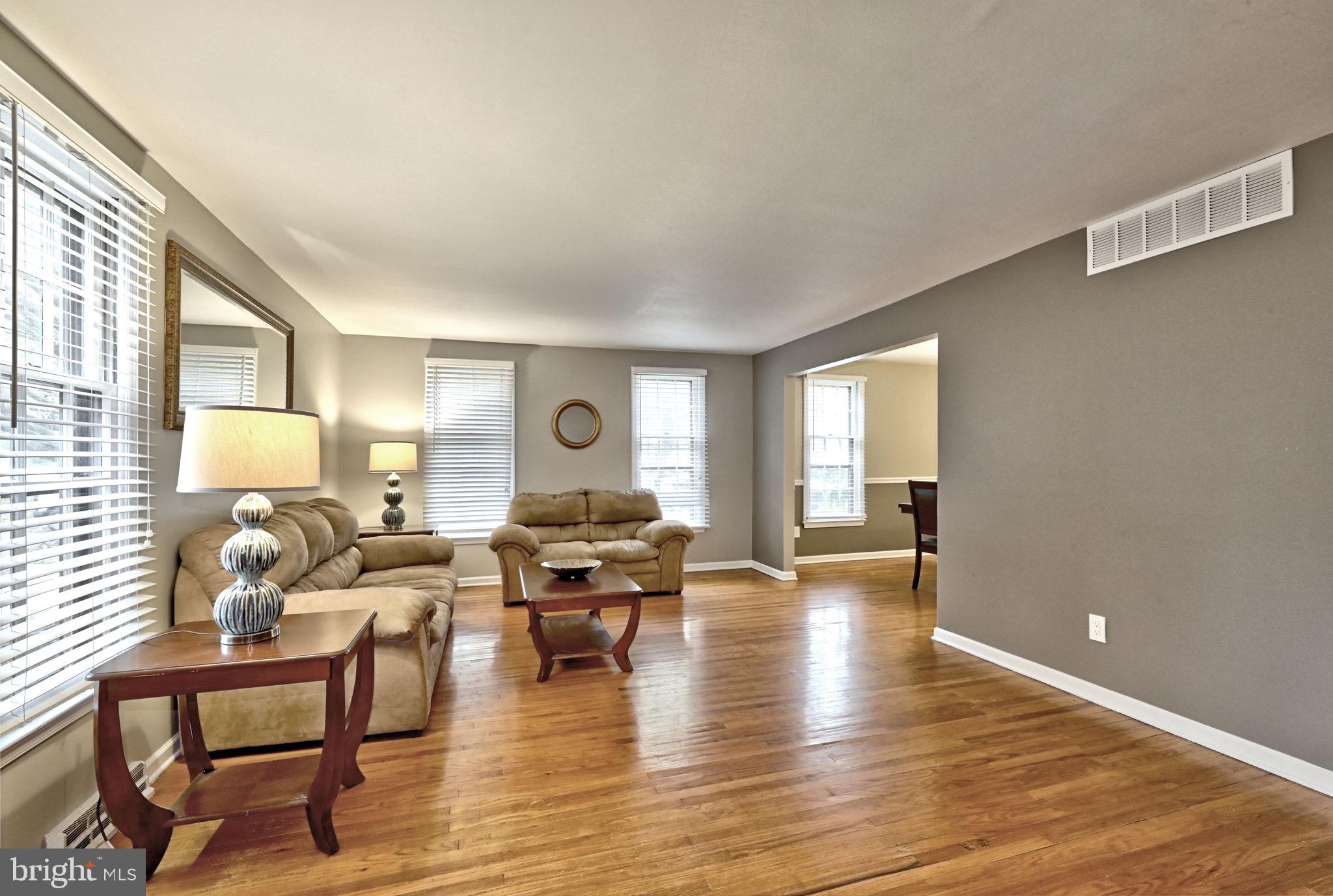 143 Whitemarsh Way Delran, NJ 08075 - Photo 7 of 33 a living room with furniture and a table
