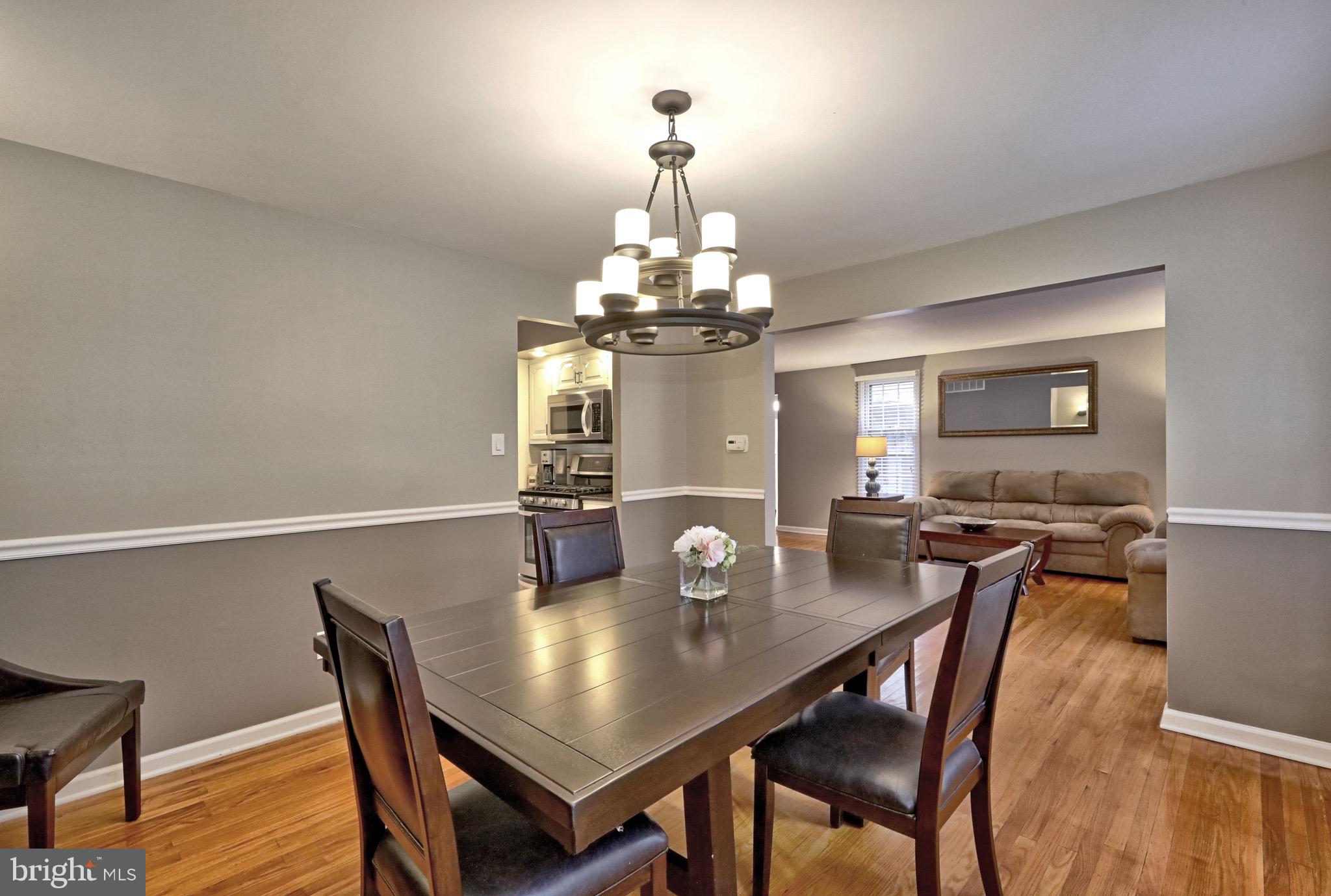 143 Whitemarsh Way Delran, NJ 08075 - Photo 10 of 33 a view of a dining room with furniture and wooden floor