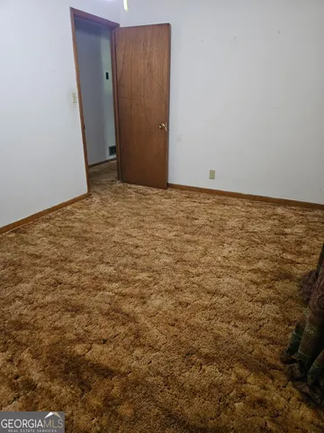 an empty room with an entryway
