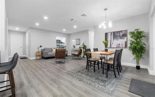 a view of a dining room with furniture