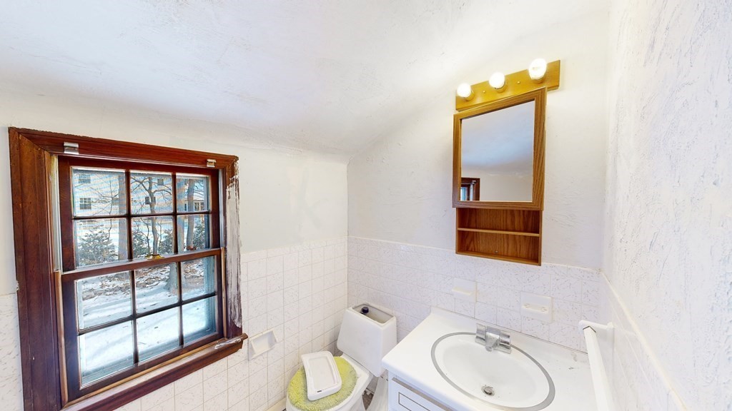 5 Scott Hill Road Ipswich, MA 01938 - Photo 13 of 25 a bathroom with a toilet sink and mirror