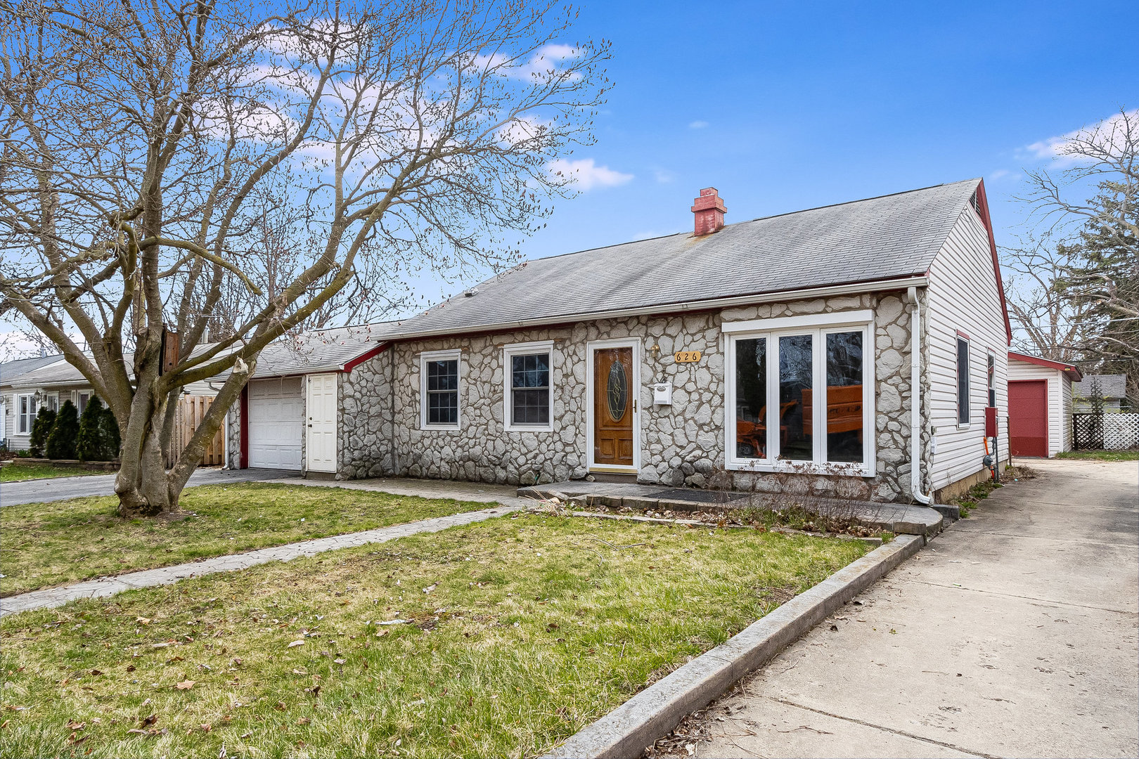 a front view of house with yard