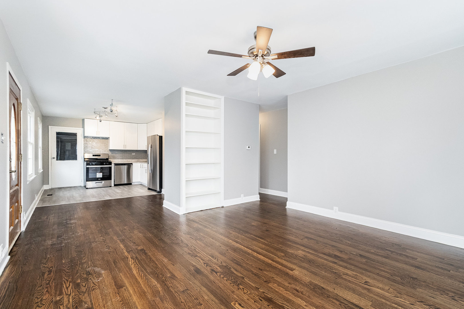 626 Iola Avenue Romeoville, IL 60446 - Photo 8 of 19 a view of a kitchen with a sink and a refrigerator