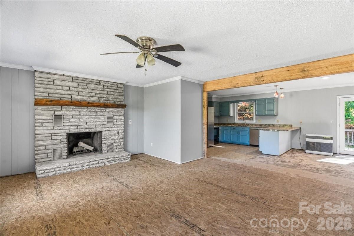 14 Jack Sullins Road Spruce Pine, NC 28777 - Photo 7 of 37 a view of a livingroom with a fireplace