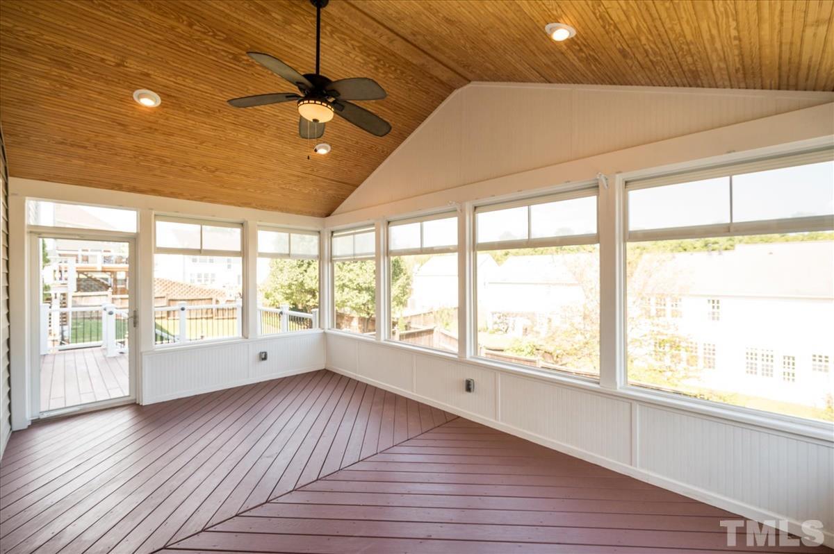 7810 San Gabriel Street Raleigh, NC 27613 - Photo 14 of 29 Incredible three season room off kitchen!