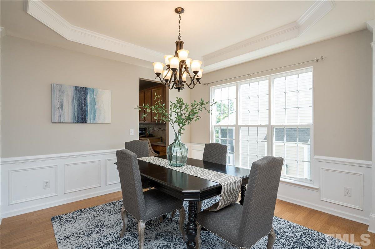 7810 San Gabriel Street Raleigh, NC 27613 - Photo 3 of 29 Light-filled dining room with great trim detail and tray ceiling