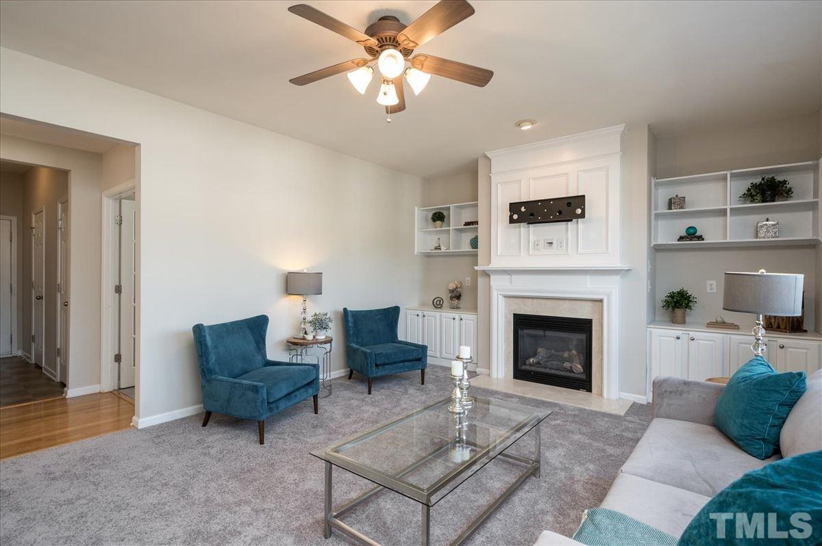 7810 San Gabriel Street Raleigh, NC 27613 - Photo 8 of 29 Spacious family room with gas fireplace and built-ins!