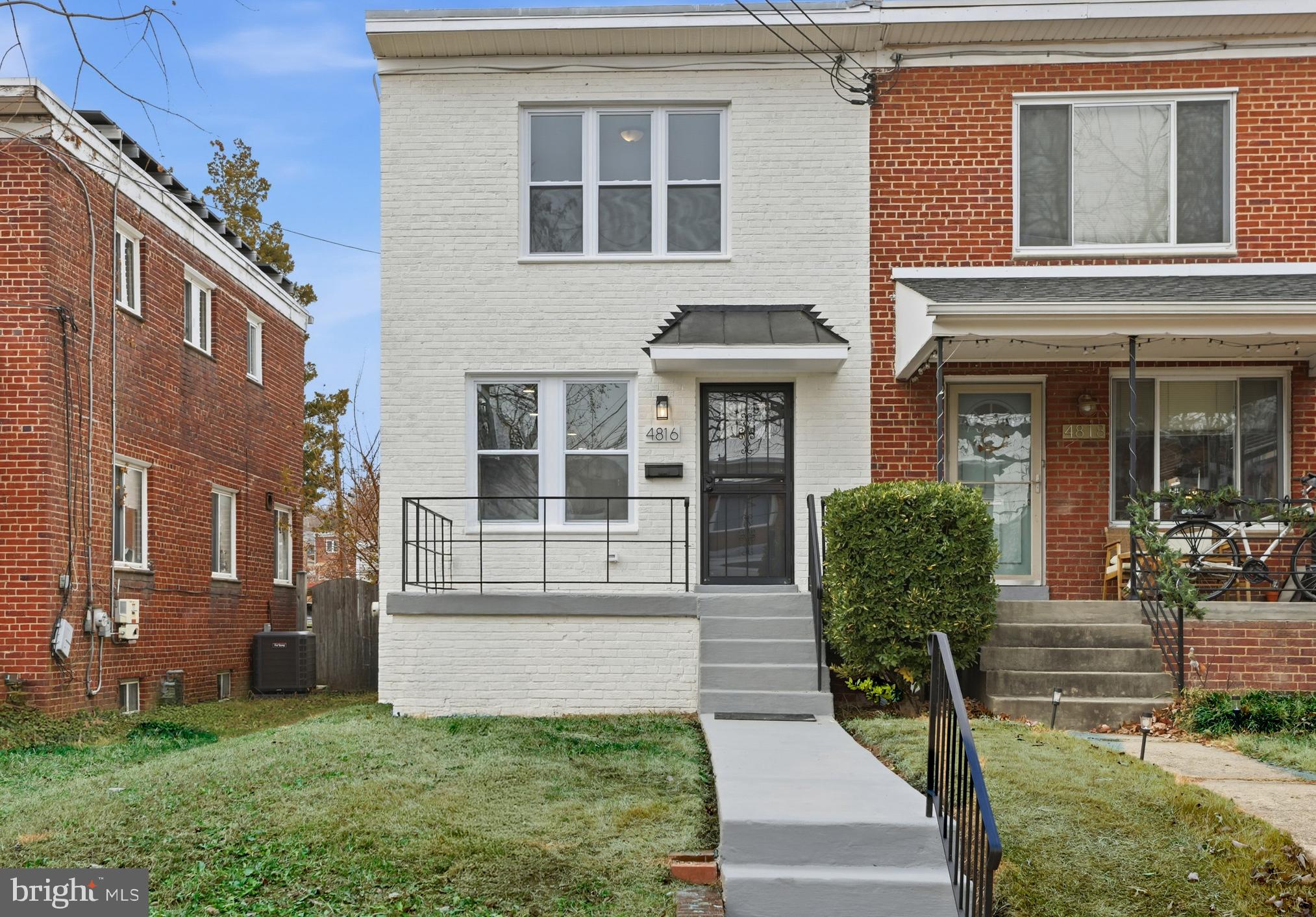 Charming duplex with inviting curb appeal.