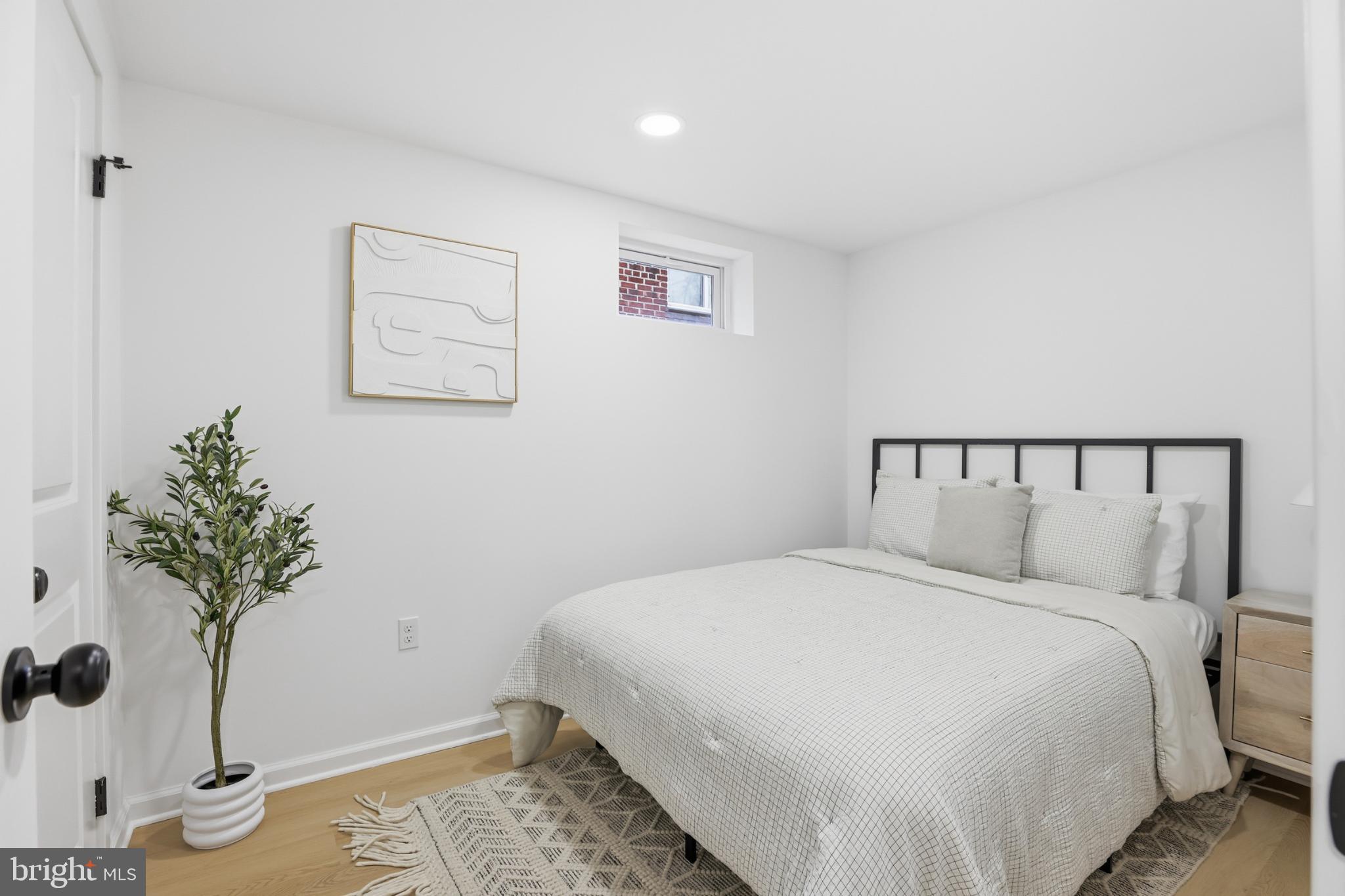 4816 8th Street Northeast Washington, DC 20017 - Photo 20 of 30 Serene bedroom with modern minimalist design.