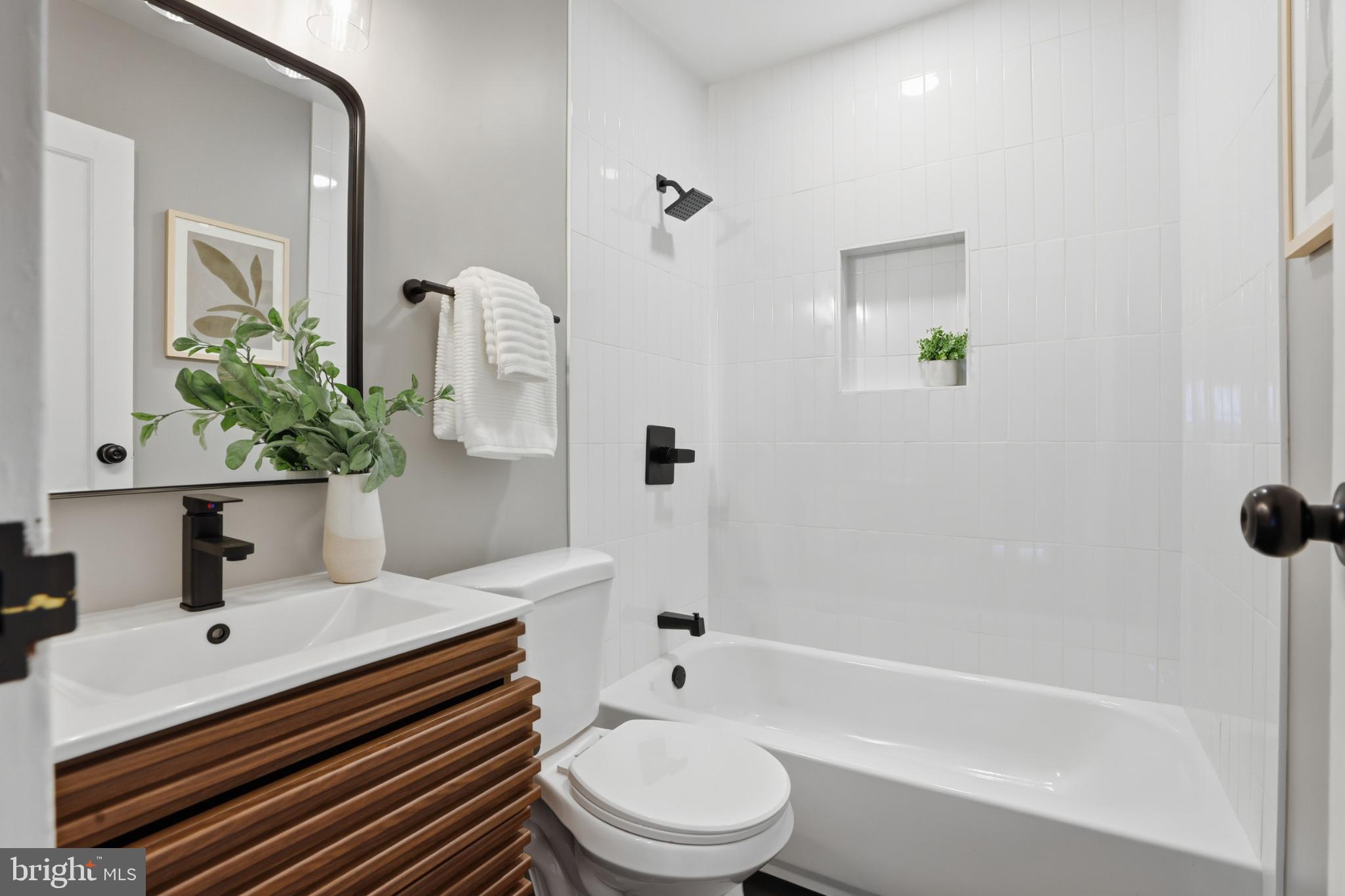 4816 8th Street Northeast Washington, DC 20017 - Photo 5 of 30 Modern bathroom with sleek design elements.