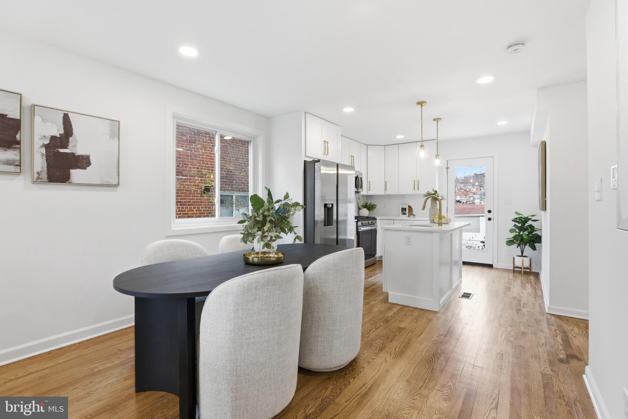 4816 8th Street Northeast Washington, DC 20017 - Photo 9 of 30 Modern kitchen with inviting dining area.