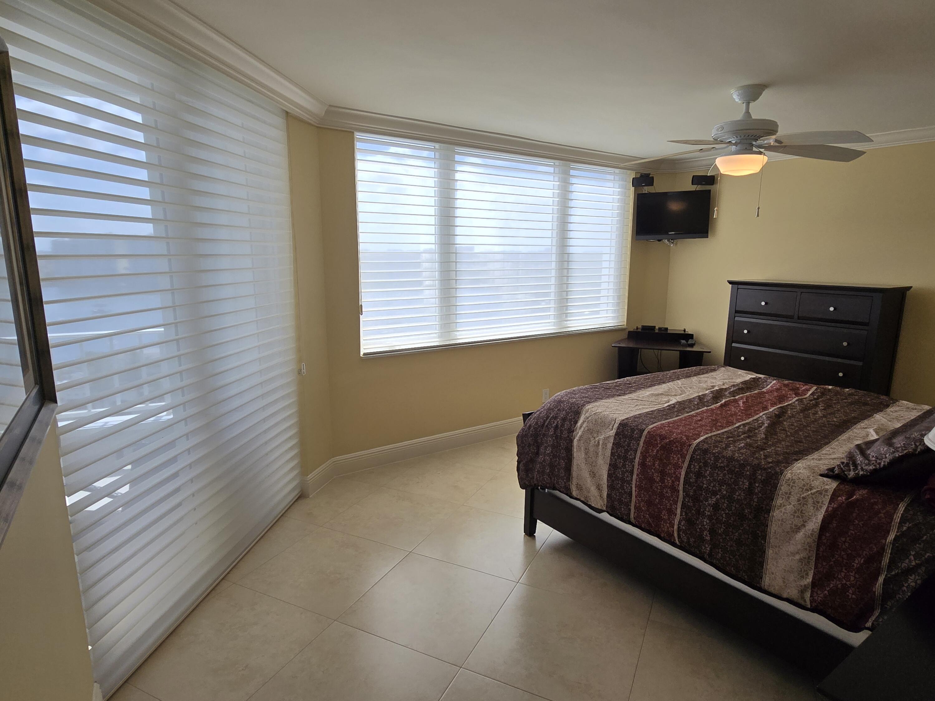 500 South Ocean Boulevard, Unit 1109 Boca Raton, FL 33432 - Photo 44 of 89 a bedroom with a bed and window
