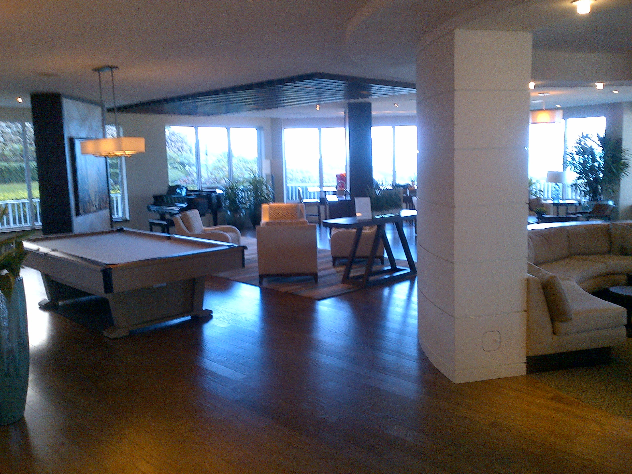 500 South Ocean Boulevard, Unit 1109 Boca Raton, FL 33432 - Photo 63 of 89 a room with wooden floors pool table and windows