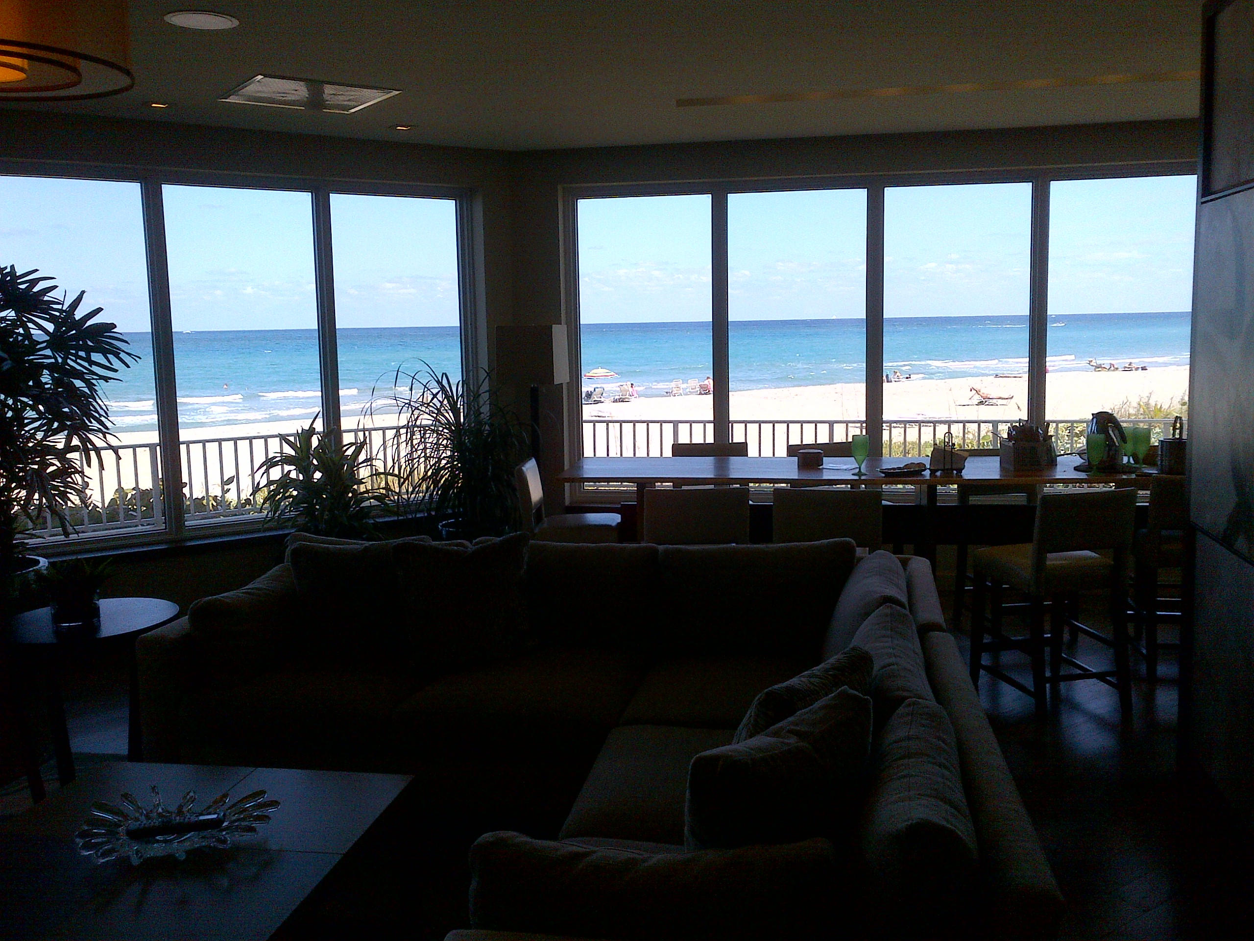 500 South Ocean Boulevard, Unit 1109 Boca Raton, FL 33432 - Photo 65 of 89 a living room with furniture and floor to ceiling window