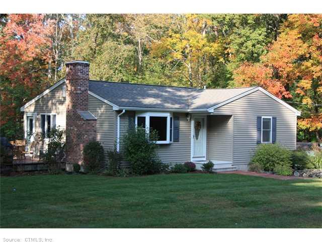 31 Old Farm Road Tolland, CT 06084 - Photo 1 of 1 a front view of a house with a yard