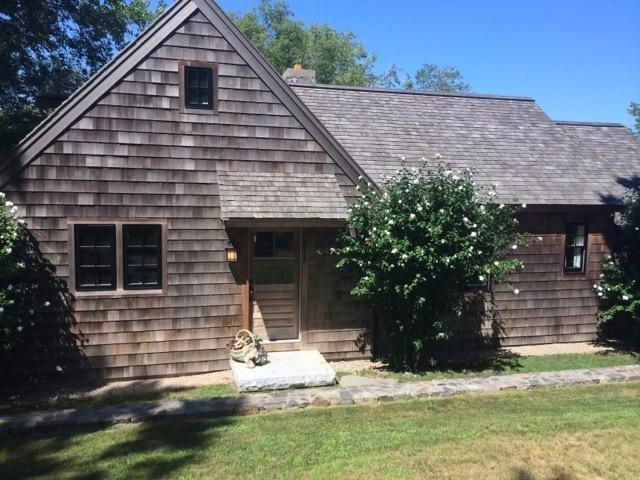 276 Holly Point Road Centerville, MA 02632 - Photo 4 of 14 a view of a house with a yard