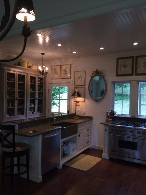 276 Holly Point Road Centerville, MA 02632 - Photo 8 of 14 a kitchen with a sink and cabinets