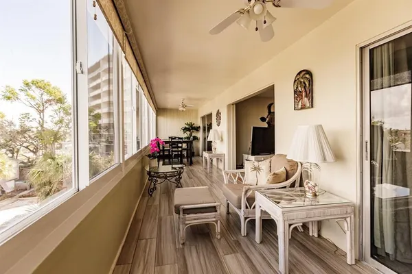 a view of a dining room with furniture window and outside view