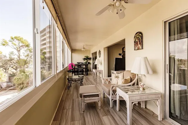 a view of a dining room with furniture window and outside view
