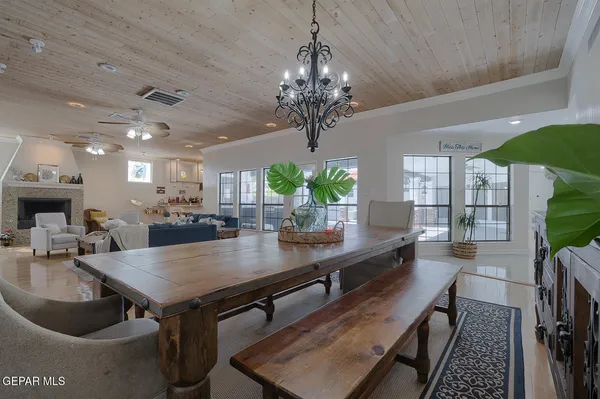 a bedroom with a bed and a ceiling fan
