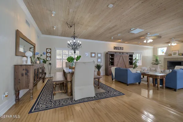 a bedroom with a bed and flat screen tv