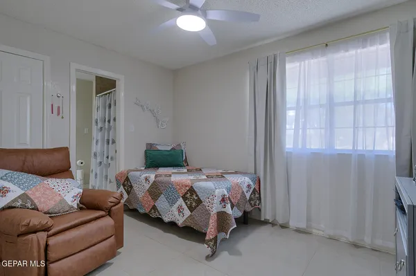 a view of a swimming pool with a yard