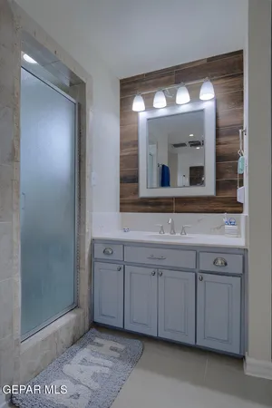 an aerial view of a house with a lake view