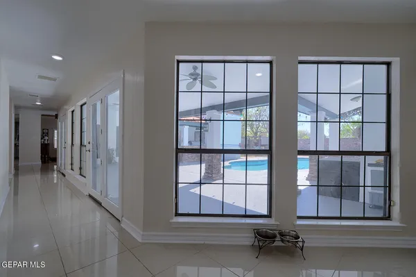 a kitchen with stainless steel appliances granite countertop a sink and a microwave