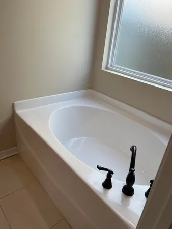 a bathroom with a bathtub