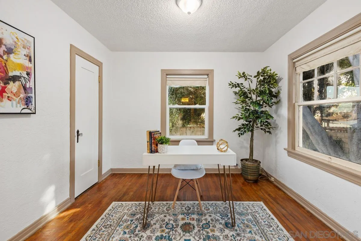 2707 Sweetwater Road Spring Valley, CA 91977 - Photo 14 of 30 a room with wooden floor and window