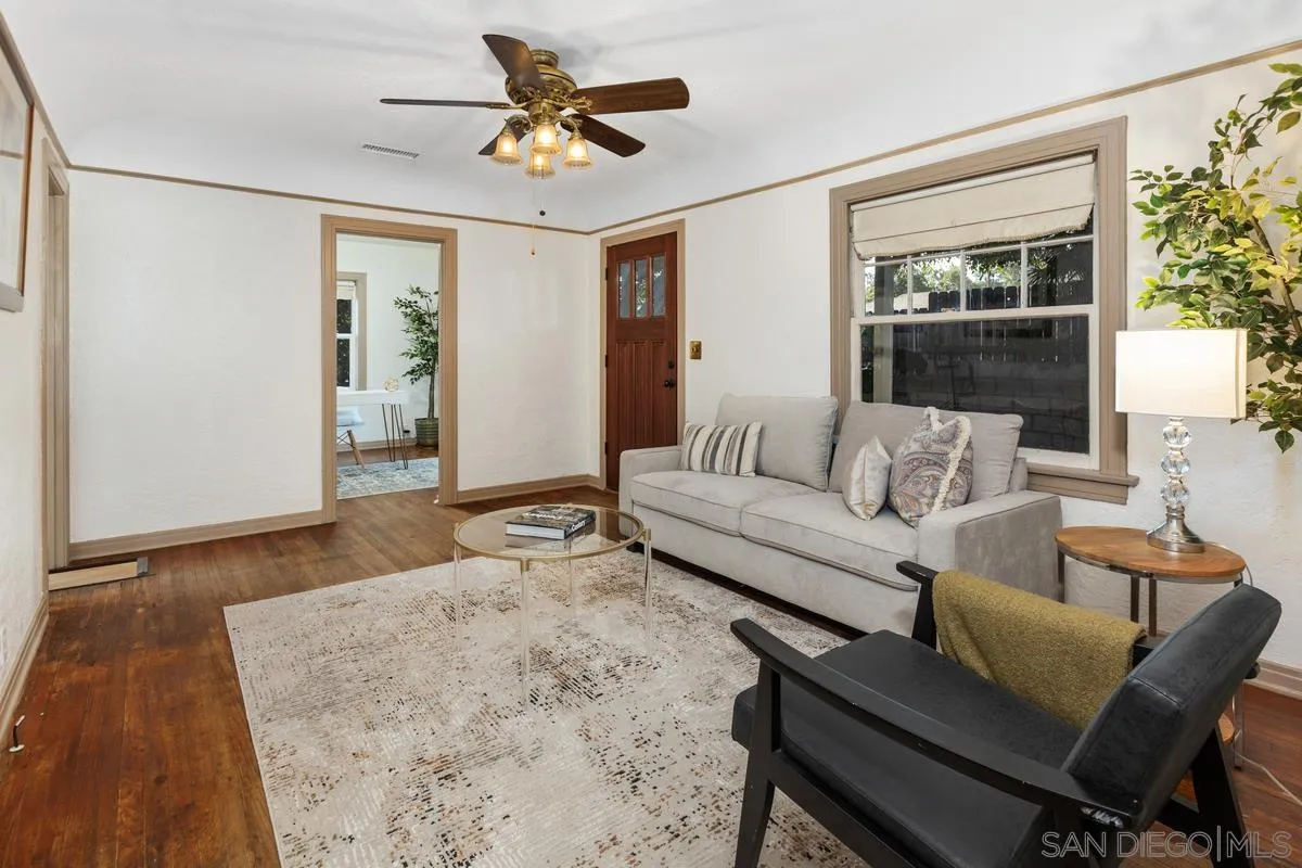 2707 Sweetwater Road Spring Valley, CA 91977 - Photo 4 of 30 a living room with furniture and a wooden floor