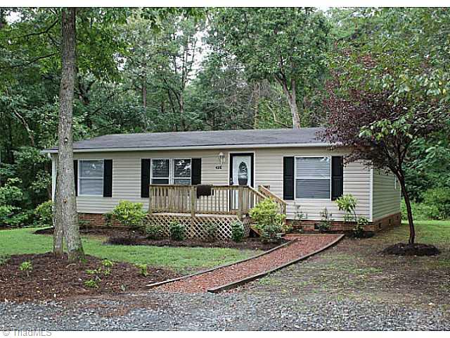 4181 Plum Tree Road Climax, NC 27233 - Photo 1 of 16 Exterior Front. Fresh landscaping