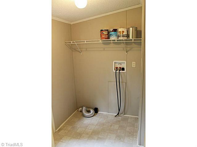4181 Plum Tree Road Climax, NC 27233 - Photo 12 of 16 Laundry Room. Walk-in Laundry Room
