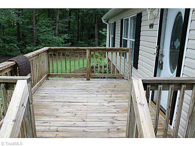 4181 Plum Tree Road Climax, NC 27233 - Photo 5 of 16 Patio/Deck. Large deck to relax and enjoy the evenings