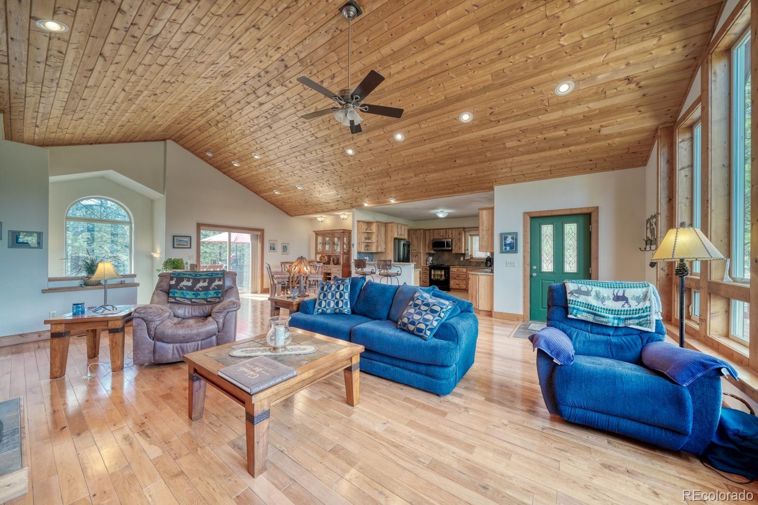 30800 West Ridge Road Buena Vista, CO 81211 - Photo 13 of 49 a living room with furniture ceiling fan and a rug