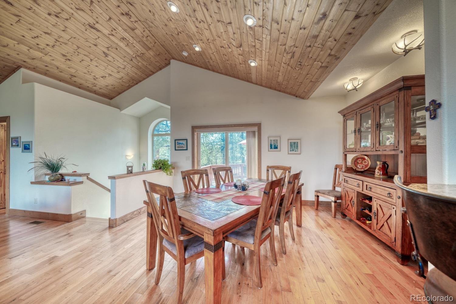 30800 West Ridge Road Buena Vista, CO 81211 - Photo 14 of 49 a dining room with furniture and wooden floor