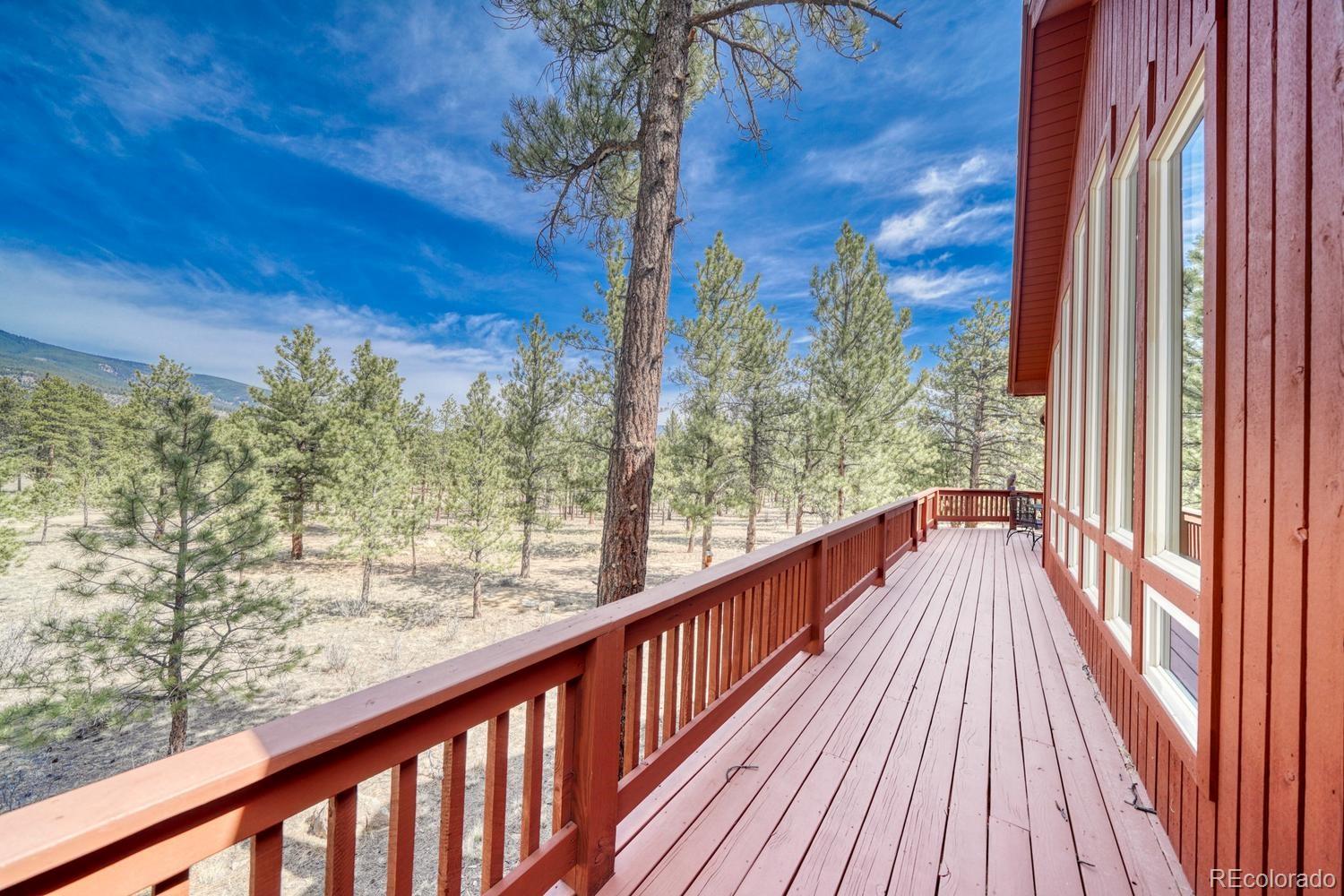 30800 West Ridge Road Buena Vista, CO 81211 - Photo 34 of 49 a view of a balcony with wooden floor and fence