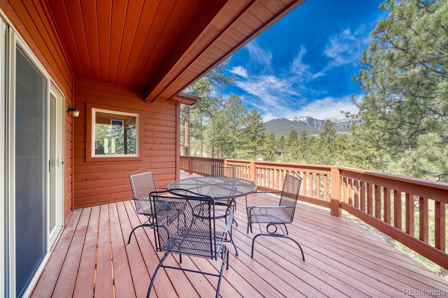 30800 West Ridge Road Buena Vista, CO 81211 - Photo 41 of 49 a view of a chairs and table on the wooden floor