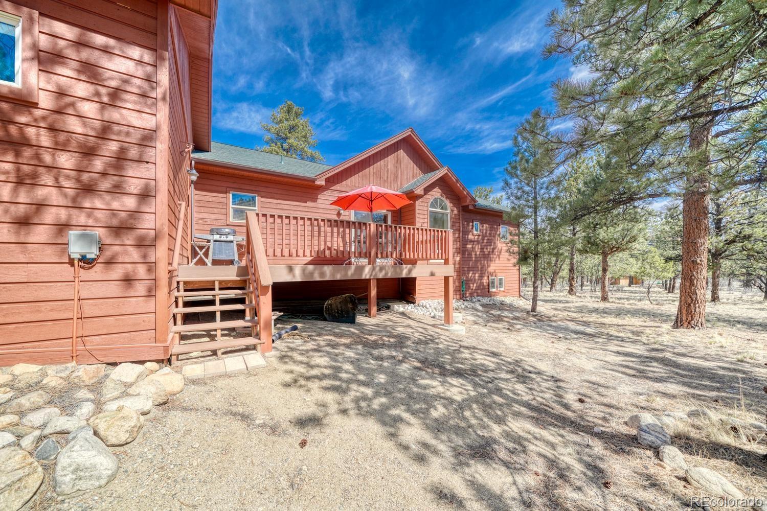 30800 West Ridge Road Buena Vista, CO 81211 - Photo 42 of 49 a view of a house with a yard in the background