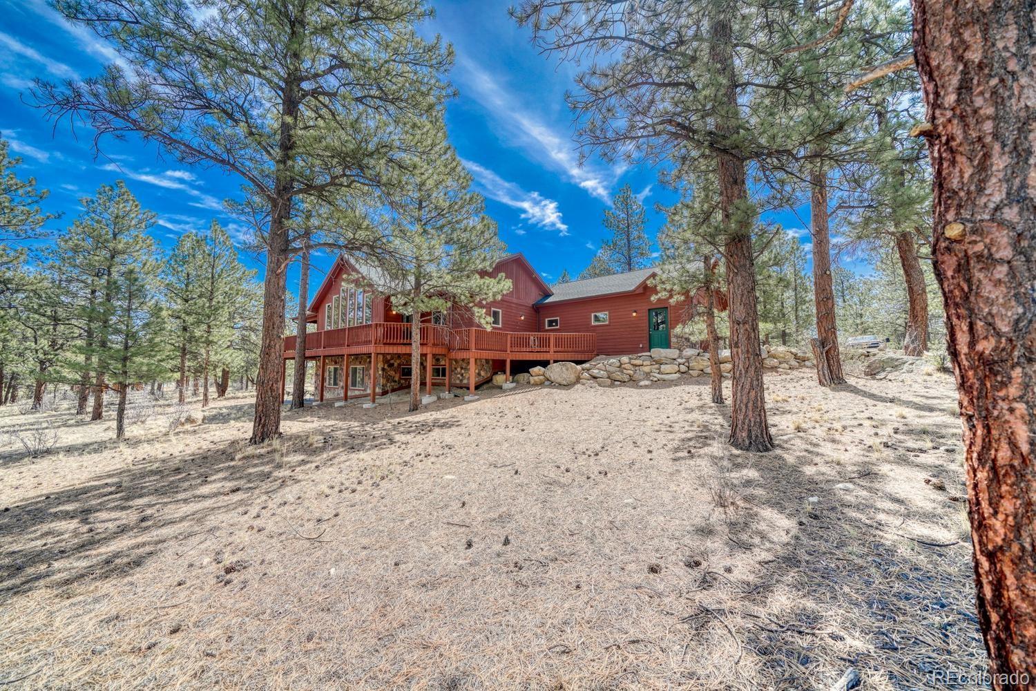 30800 West Ridge Road Buena Vista, CO 81211 - Photo 45 of 49 a view of a house with a yard covered in snow
