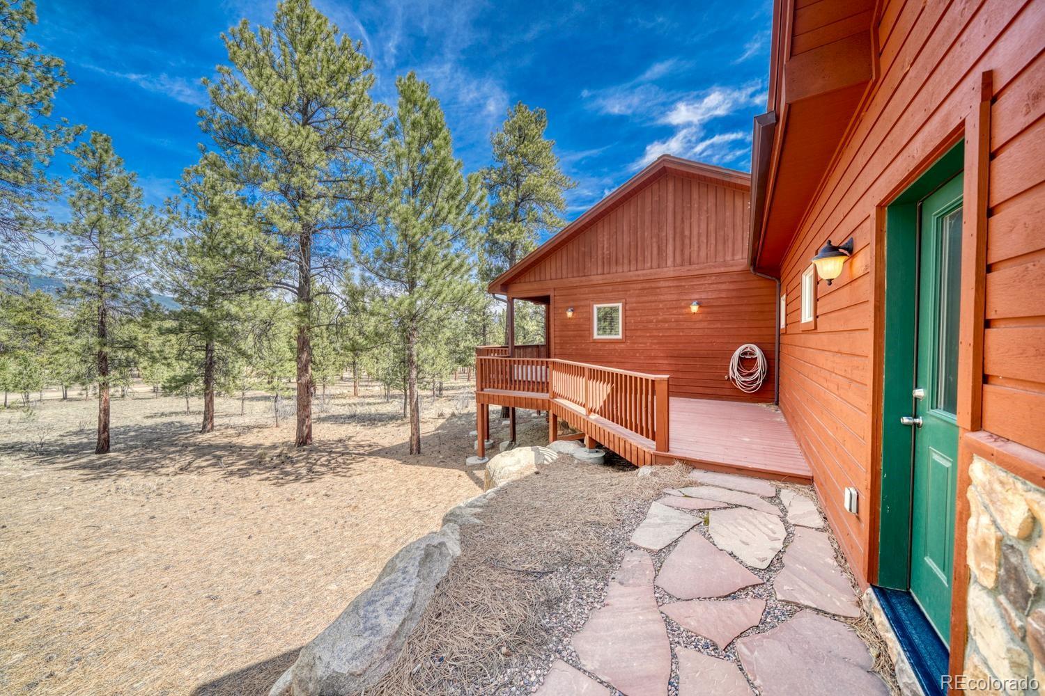 30800 West Ridge Road Buena Vista, CO 81211 - Photo 47 of 49 a view of a house with a wooden fence