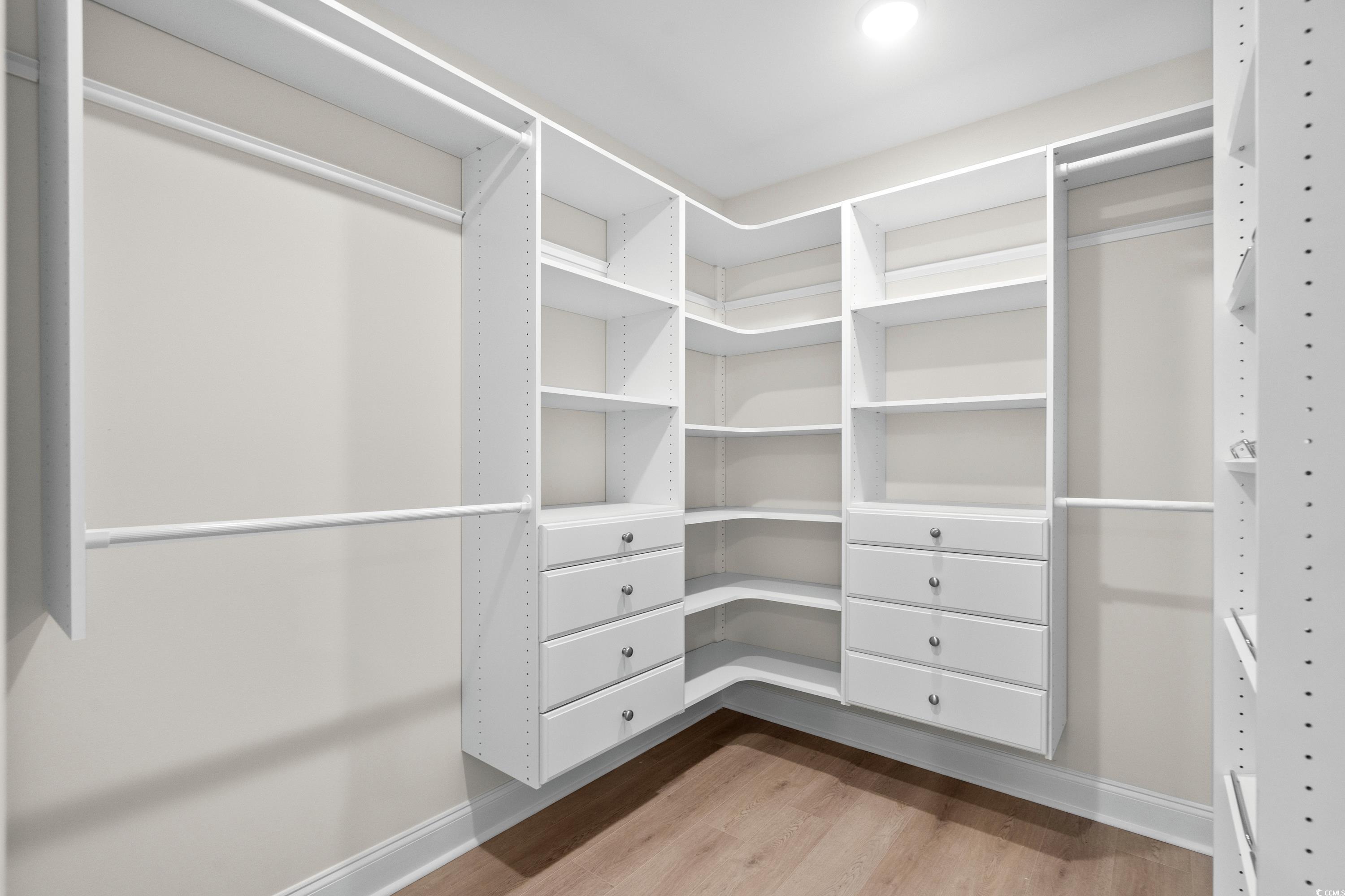3013 Fiddler Court Loris, SC 29569 - Photo 21 of 30 Spacious closet with hardwood / wood-style floorin