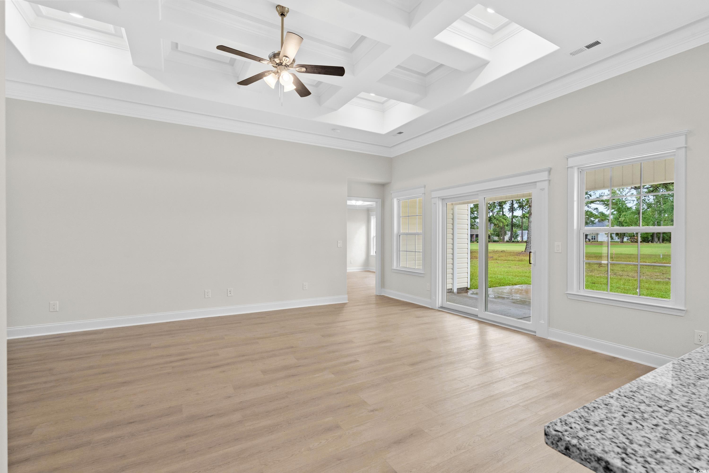 3013 Fiddler Court Loris, SC 29569 - Photo 4 of 30 Unfurnished living room featuring ceiling fan, bea