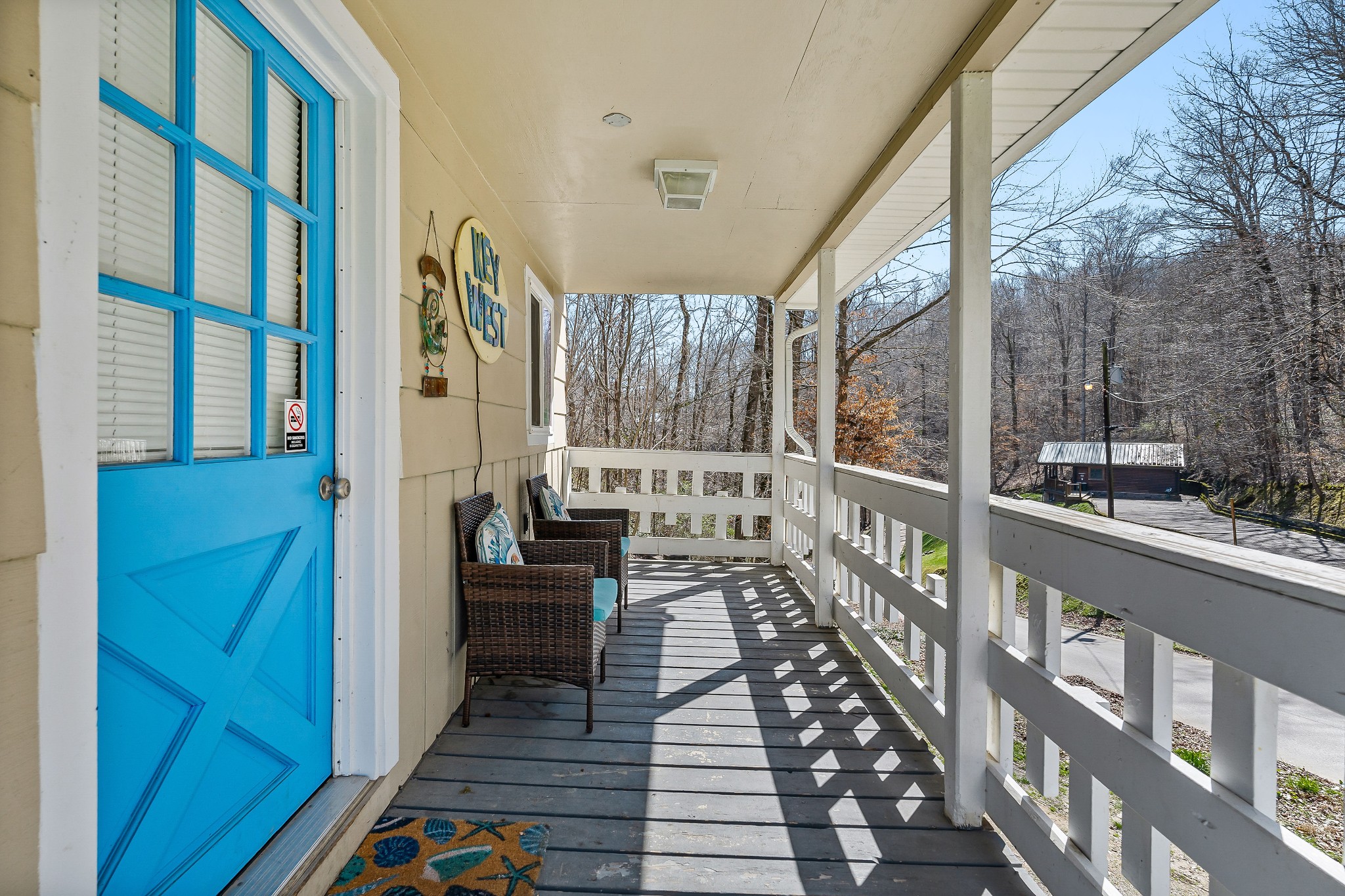 5641 Eastport Road Alpine, TN 38543 - Photo 12 of 15 a view of a balcony with chairs