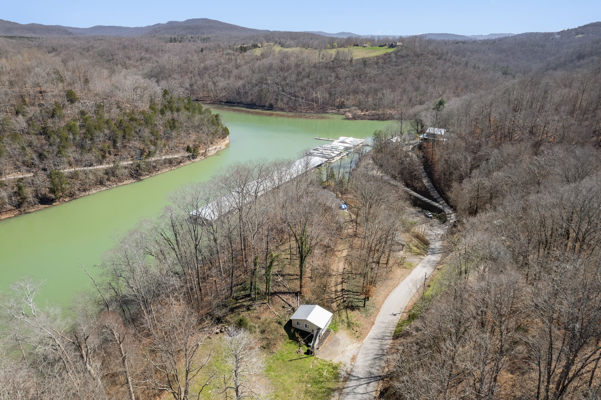 5641 Eastport Road Alpine, TN 38543 - Photo 4 of 15 a view of a lake with a mountain