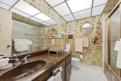 a bathroom with a sink and mirror