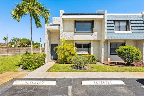a view of a backyard of the house