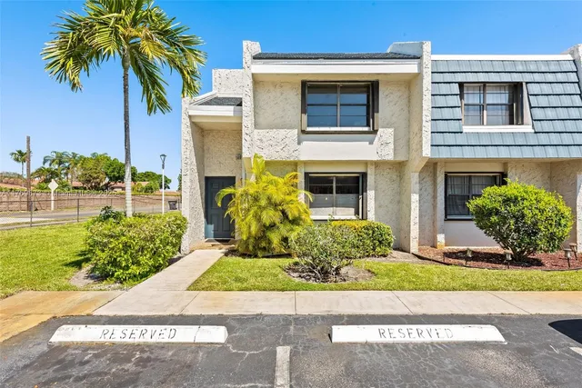 a view of a backyard of the house